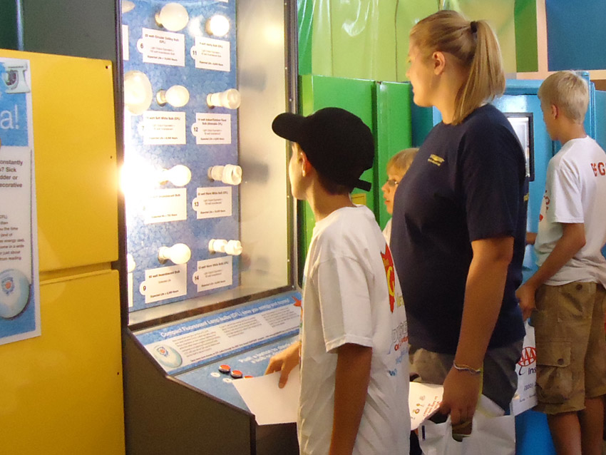 Guests interact with Gridsmart Ohio educational display