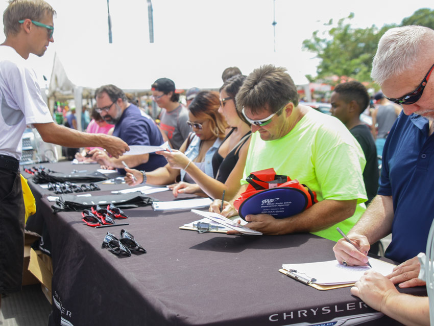 Guests at promotions table at Ohio State Fair